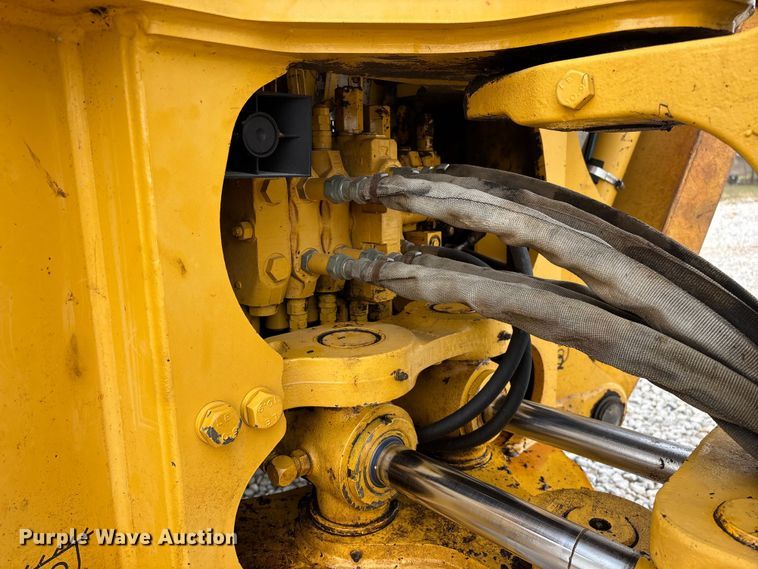 image for item ED2444 1999 John Deere 310E backhoe