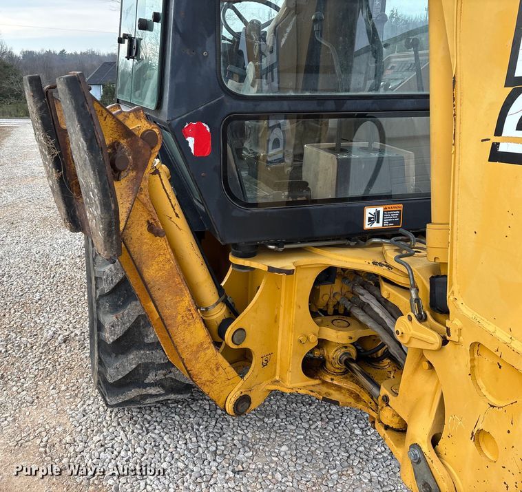 image for item ED2444 1999 John Deere 310E backhoe