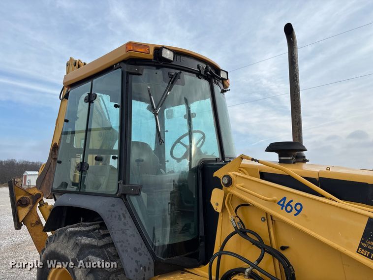 image for item ED2444 1999 John Deere 310E backhoe