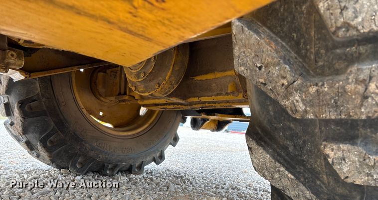 image for item ED2444 1999 John Deere 310E backhoe