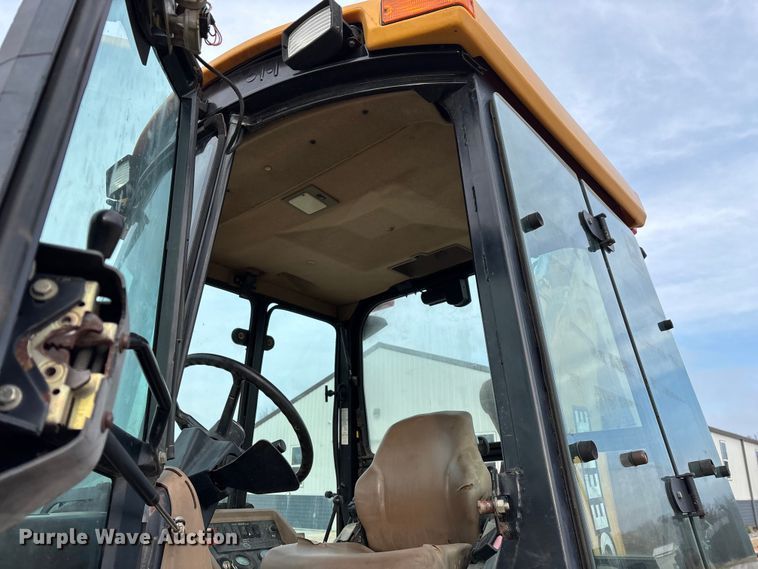 image for item ED2444 1999 John Deere 310E backhoe