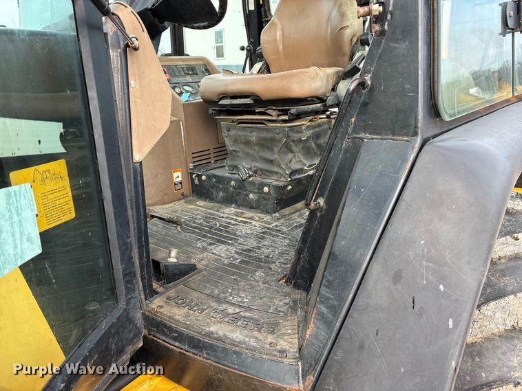 image for item ED2444 1999 John Deere 310E backhoe