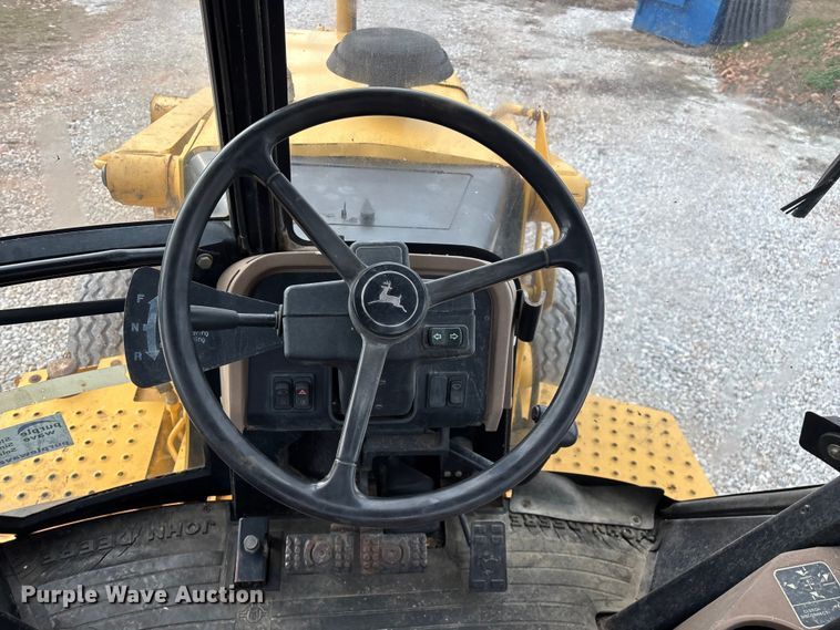 image for item ED2444 1999 John Deere 310E backhoe