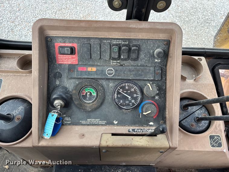 image for item ED2444 1999 John Deere 310E backhoe