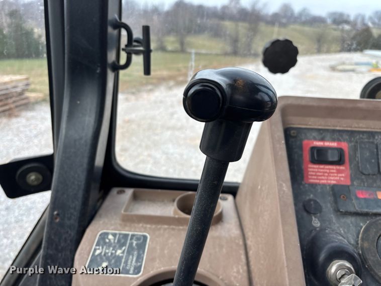 image for item ED2444 1999 John Deere 310E backhoe