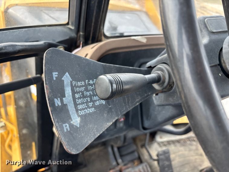 image for item ED2444 1999 John Deere 310E backhoe