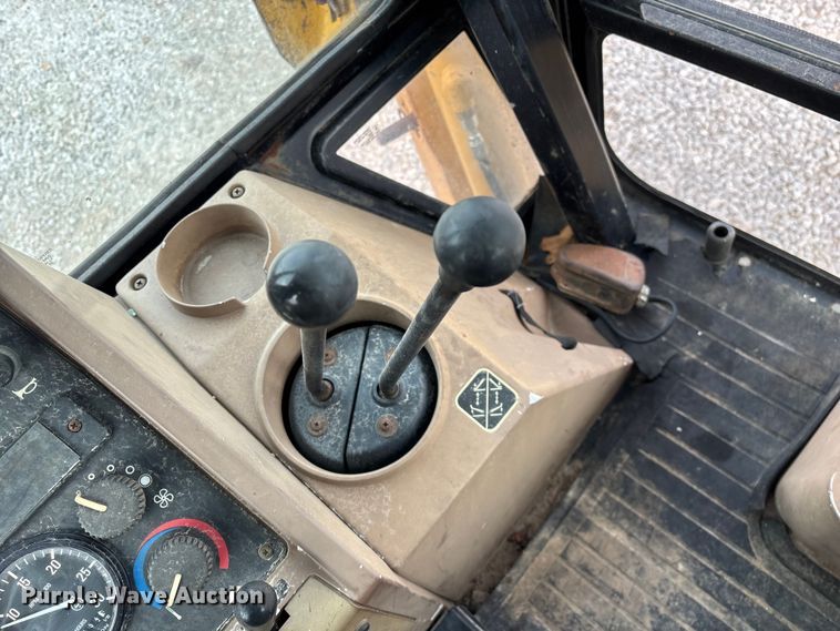 image for item ED2444 1999 John Deere 310E backhoe