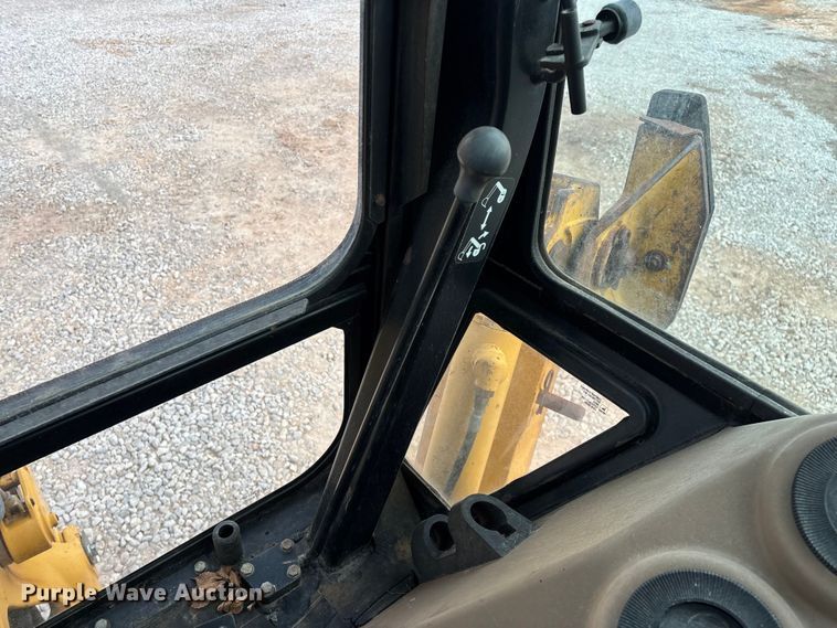 image for item ED2444 1999 John Deere 310E backhoe