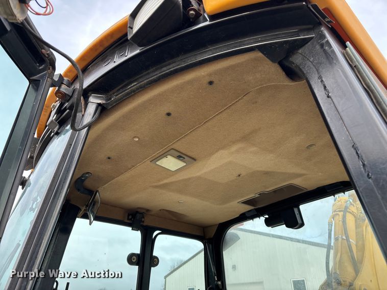 image for item ED2444 1999 John Deere 310E backhoe