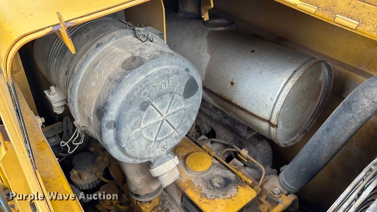 image for item ED2444 1999 John Deere 310E backhoe