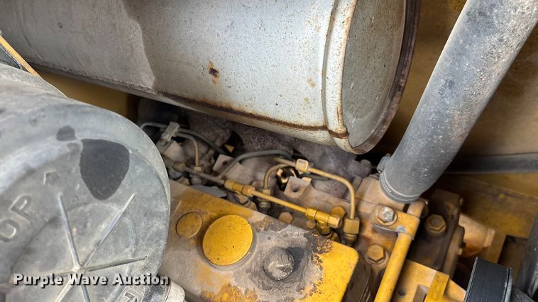 image for item ED2444 1999 John Deere 310E backhoe