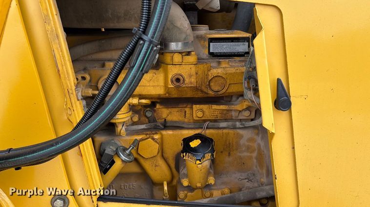 image for item ED2444 1999 John Deere 310E backhoe