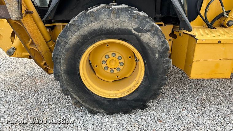 image for item ED2444 1999 John Deere 310E backhoe