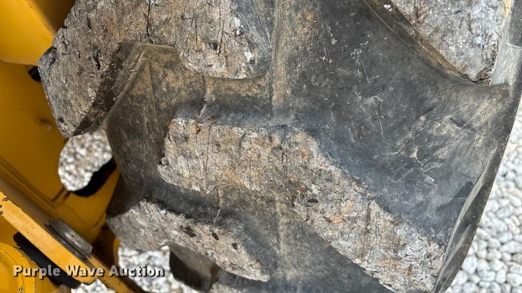 image for item ED2444 1999 John Deere 310E backhoe