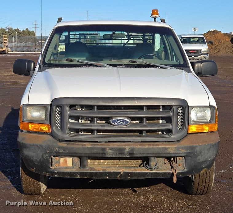 image for item ES2636 1999 Ford F250 flatbed pickup truck
