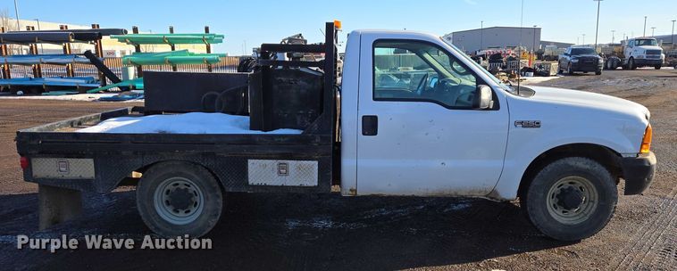 image for item ES2636 1999 Ford F250 flatbed pickup truck