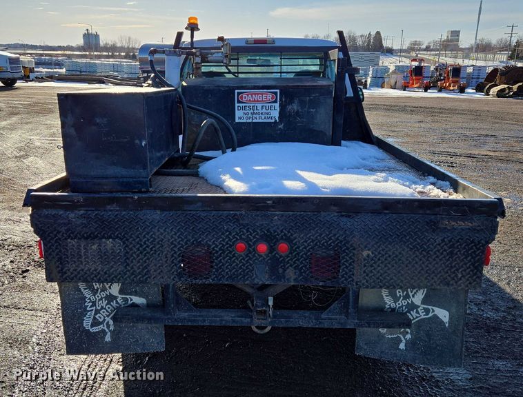image for item ES2636 1999 Ford F250 flatbed pickup truck