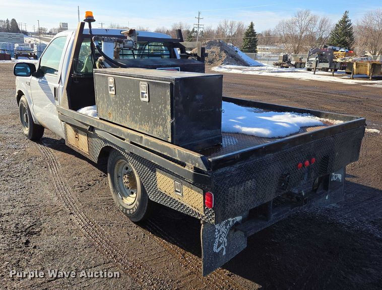 image for item ES2636 1999 Ford F250 flatbed pickup truck
