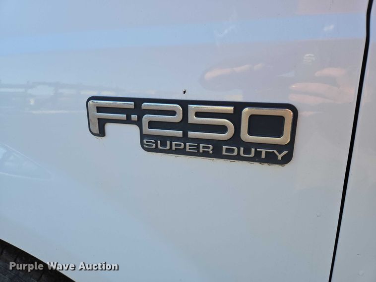 image for item ES2636 1999 Ford F250 flatbed pickup truck