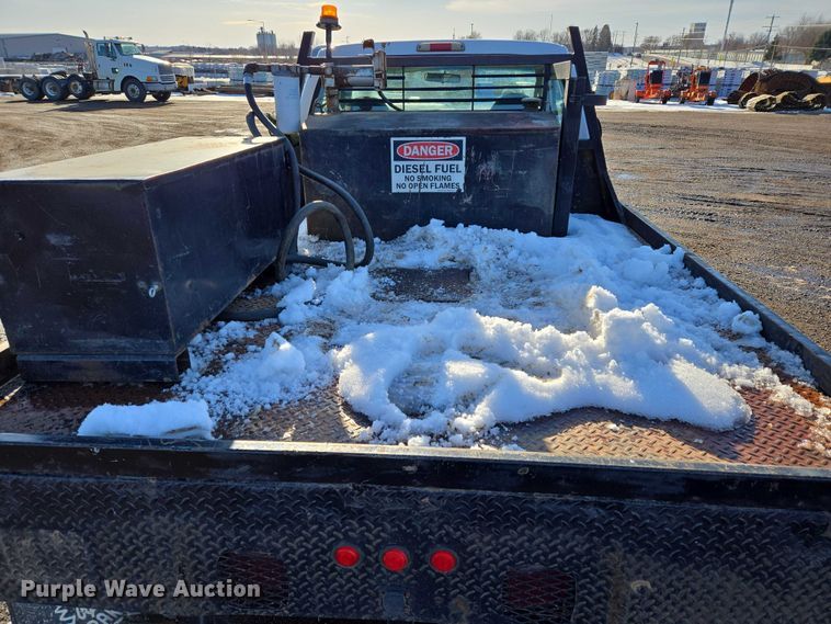 image for item ES2636 1999 Ford F250 flatbed pickup truck