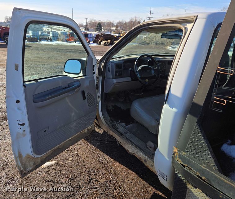 image for item ES2636 1999 Ford F250 flatbed pickup truck