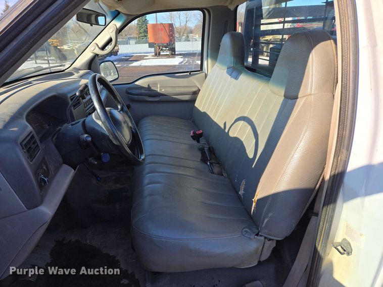 image for item ES2636 1999 Ford F250 flatbed pickup truck