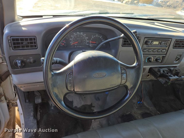 image for item ES2636 1999 Ford F250 flatbed pickup truck