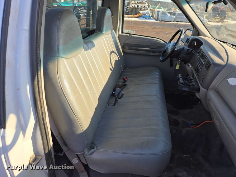 image for item ES2636 1999 Ford F250 flatbed pickup truck