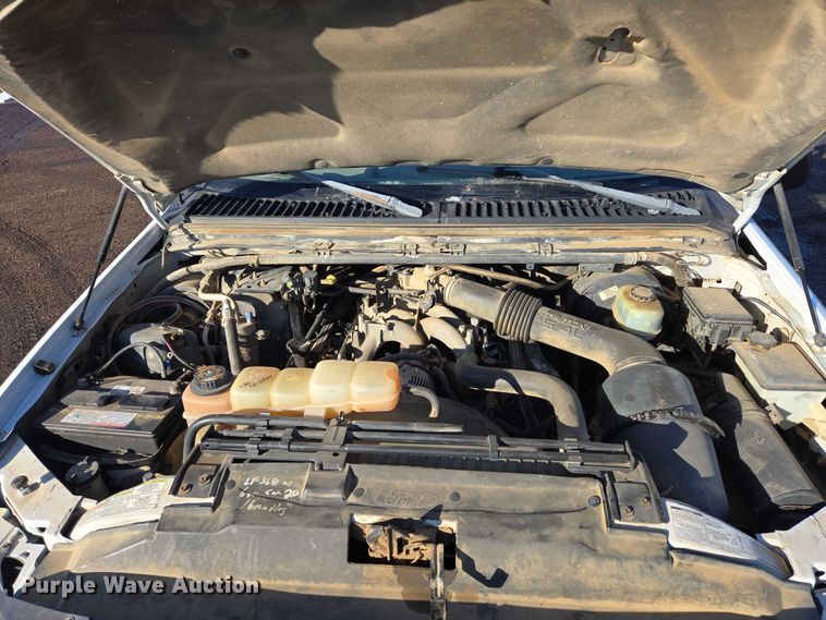 image for item ES2636 1999 Ford F250 flatbed pickup truck