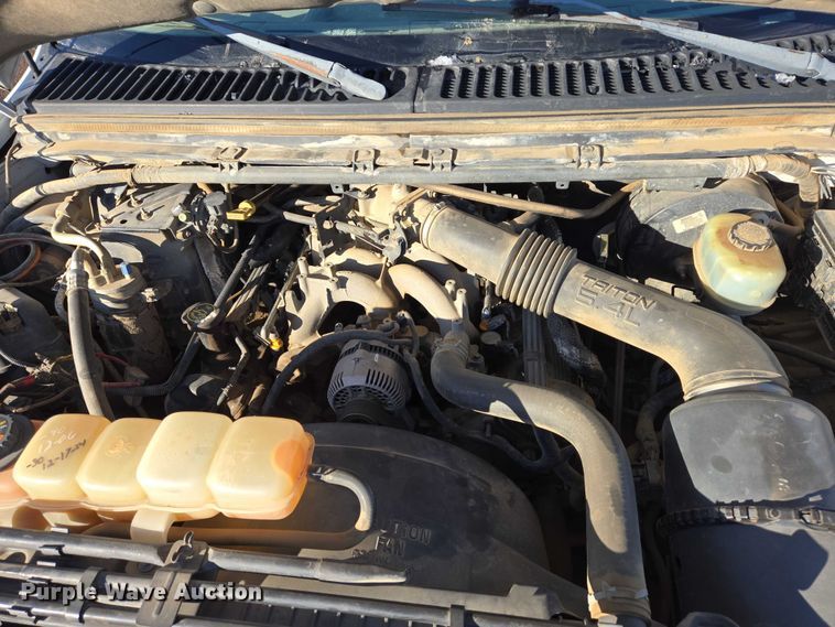 image for item ES2636 1999 Ford F250 flatbed pickup truck