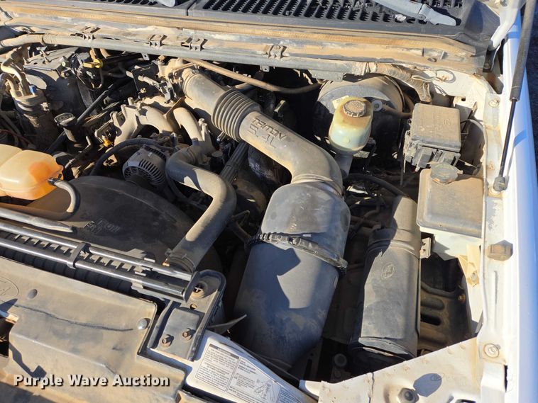 image for item ES2636 1999 Ford F250 flatbed pickup truck