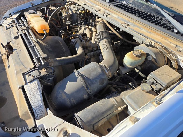 image for item ES2636 1999 Ford F250 flatbed pickup truck