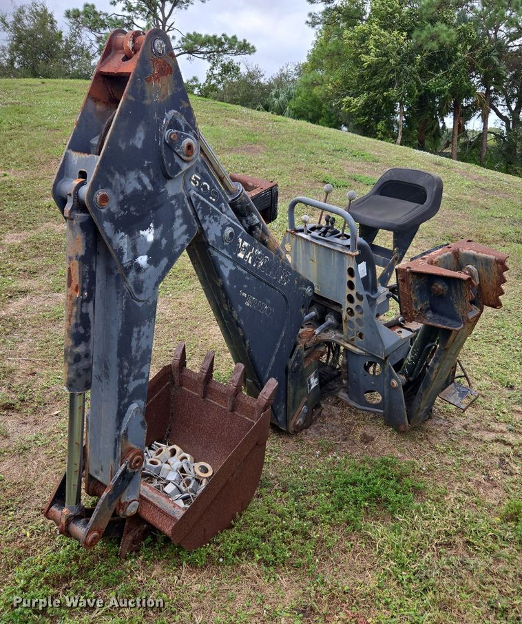 image for item DU2583 New Holland 609 skid steer backhoe