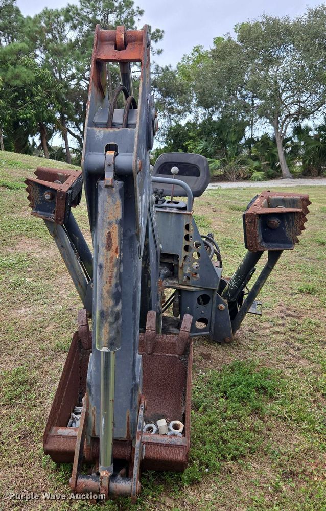 image for item DU2583 New Holland 609 skid steer backhoe