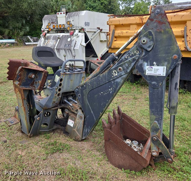 image for item DU2583 New Holland 609 skid steer backhoe