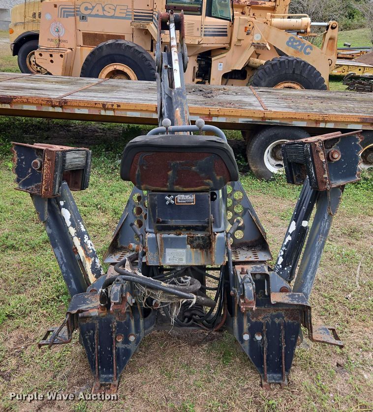 image for item DU2583 New Holland 609 skid steer backhoe