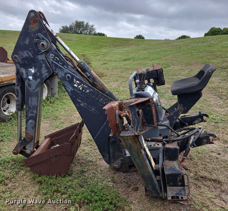image for item DU2583 New Holland 609 skid steer backhoe