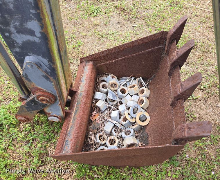 image for item DU2583 New Holland 609 skid steer backhoe