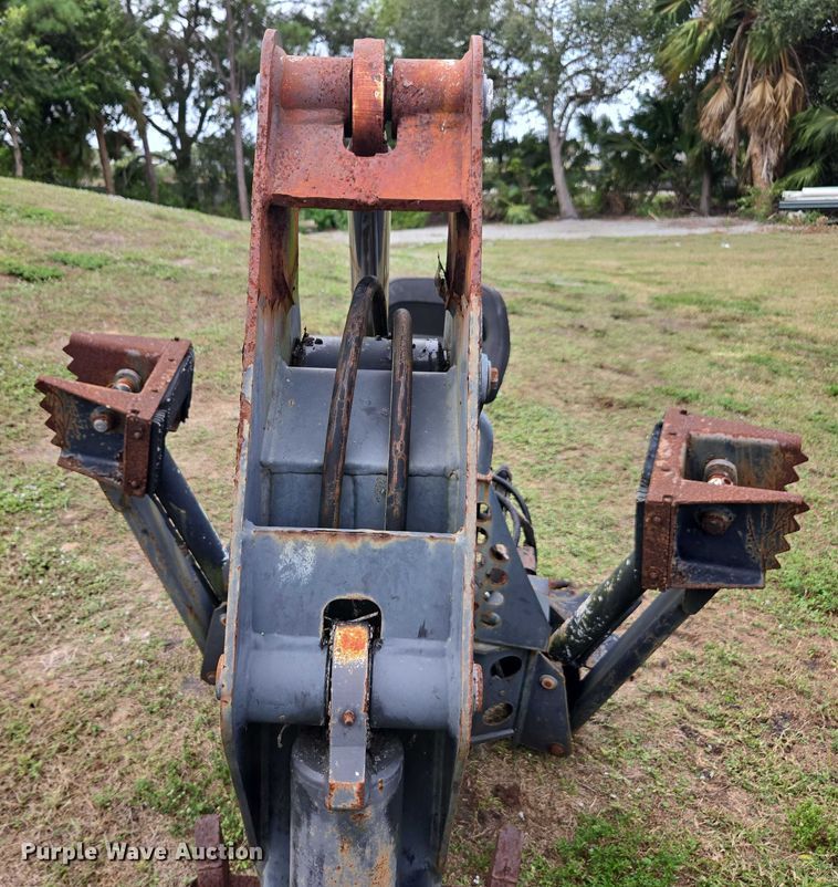 image for item DU2583 New Holland 609 skid steer backhoe