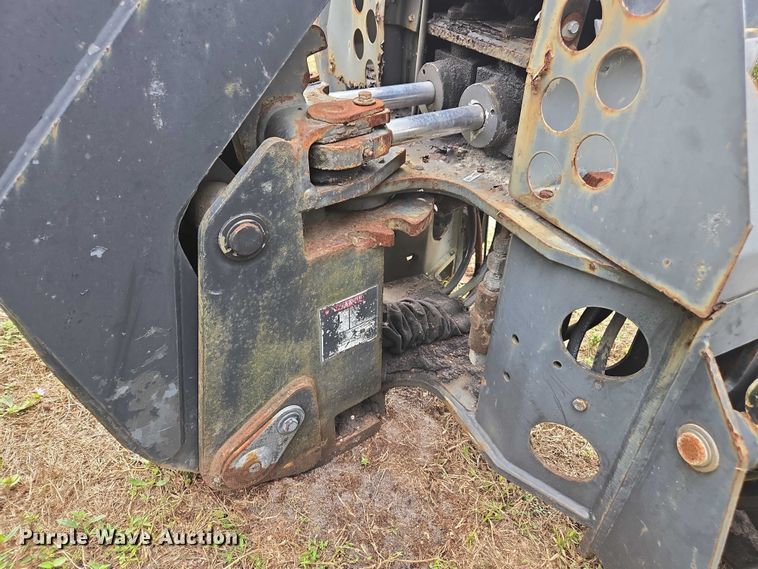 image for item DU2583 New Holland 609 skid steer backhoe