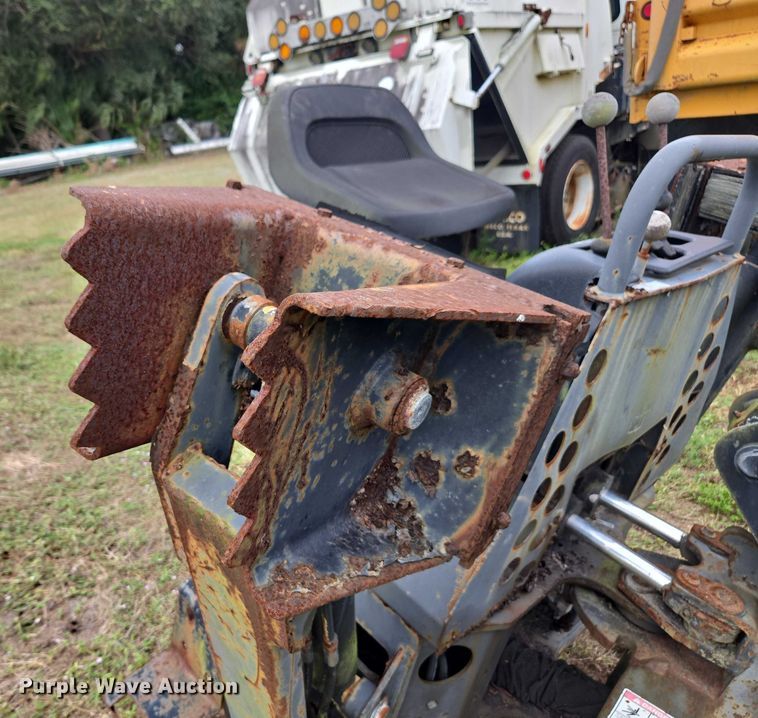 image for item DU2583 New Holland 609 skid steer backhoe