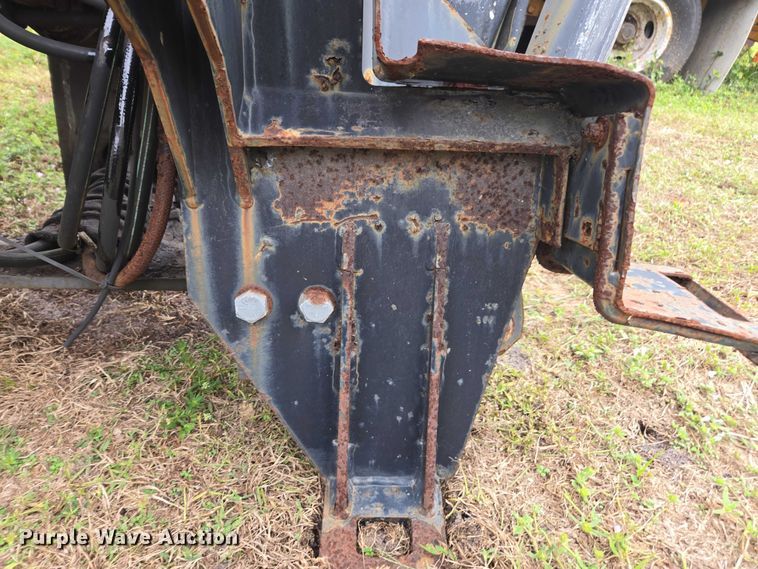 image for item DU2583 New Holland 609 skid steer backhoe