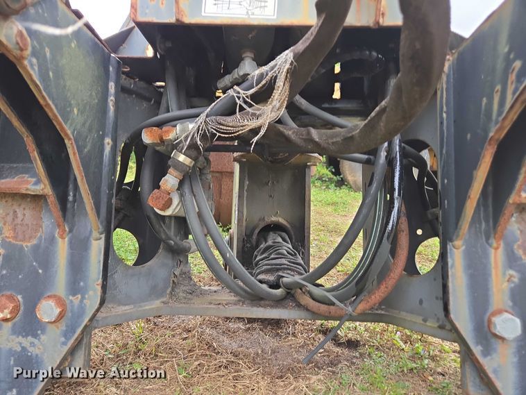 image for item DU2583 New Holland 609 skid steer backhoe