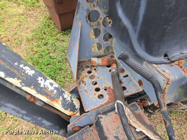 image for item DU2583 New Holland 609 skid steer backhoe