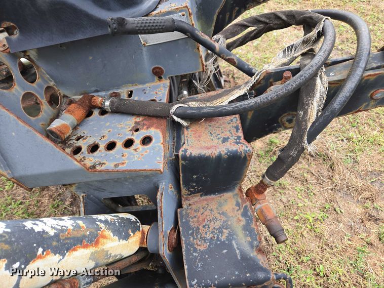 image for item DU2583 New Holland 609 skid steer backhoe