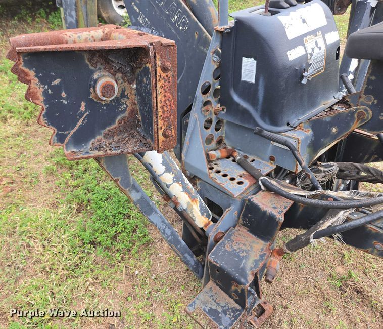 image for item DU2583 New Holland 609 skid steer backhoe