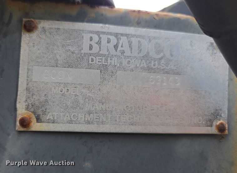 image for item DU2583 New Holland 609 skid steer backhoe