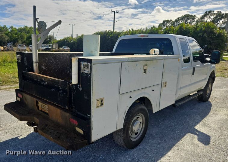 image for item DU2638 2015 Ford F250 Super Duty XL Ext. Cab utility bed pickup truck