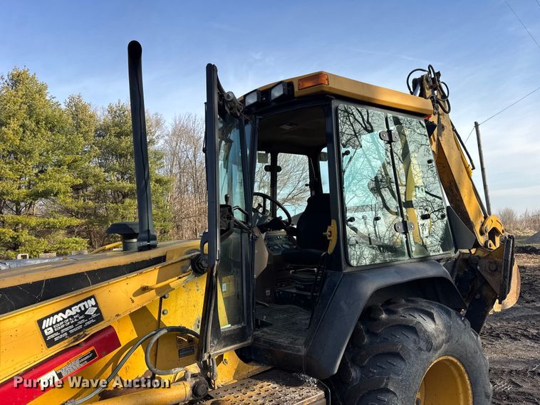 image for item ER0365 1998 John Deere 310E backhoe