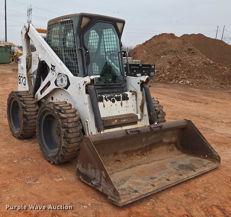 image for item ET1010 2002 Bobcat 873 skid steer loader